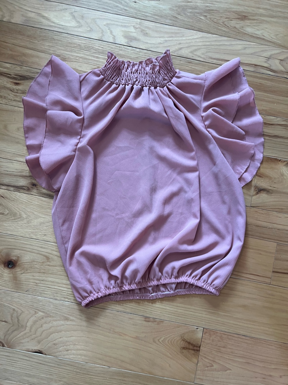 Discreet Pink Ruffle Sleeve Smocked Neck Top
